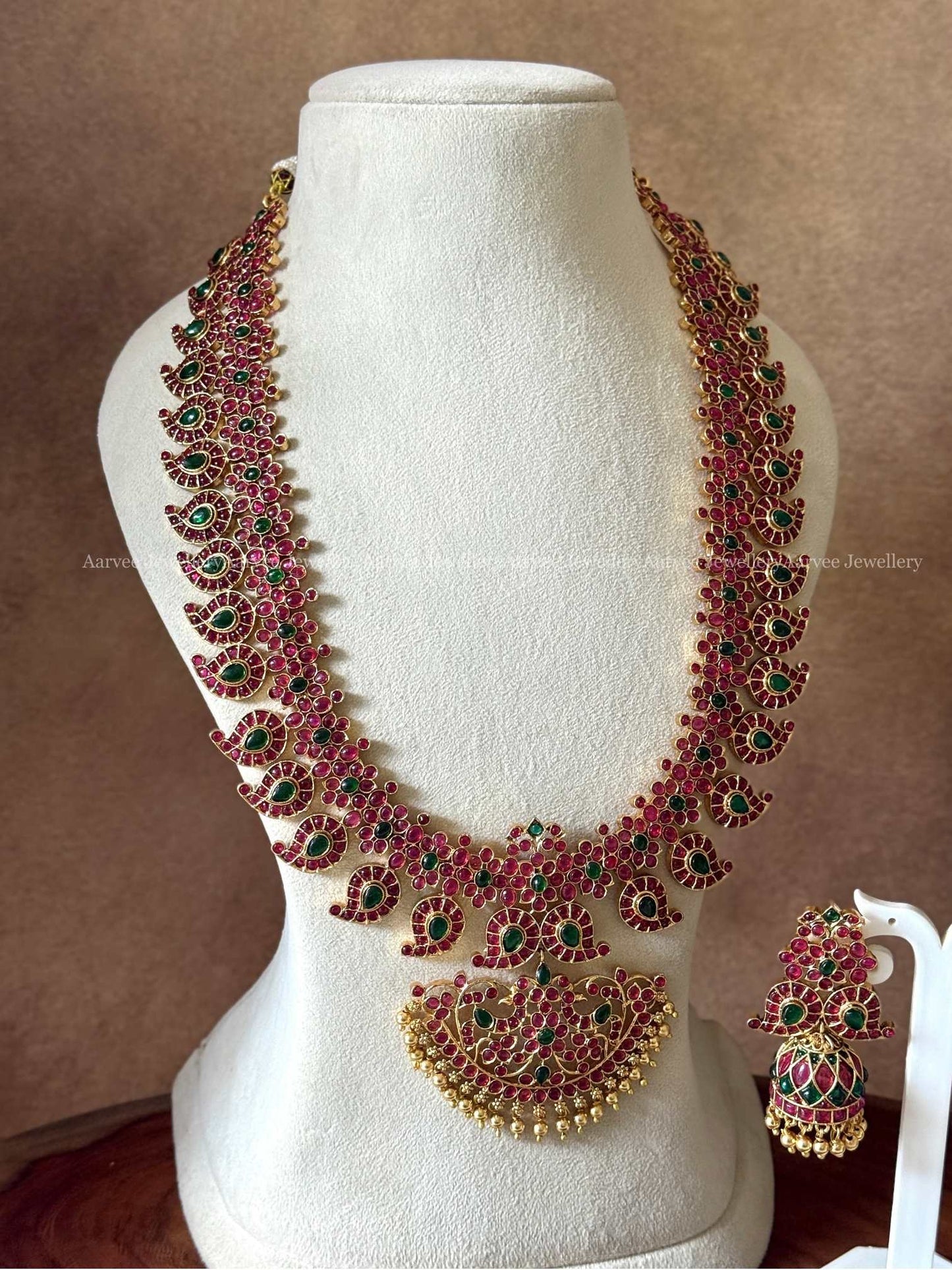 A CLASSIC MANGO MOTIF HARAM SET WITH KEMP RUBY / GREEN STONES