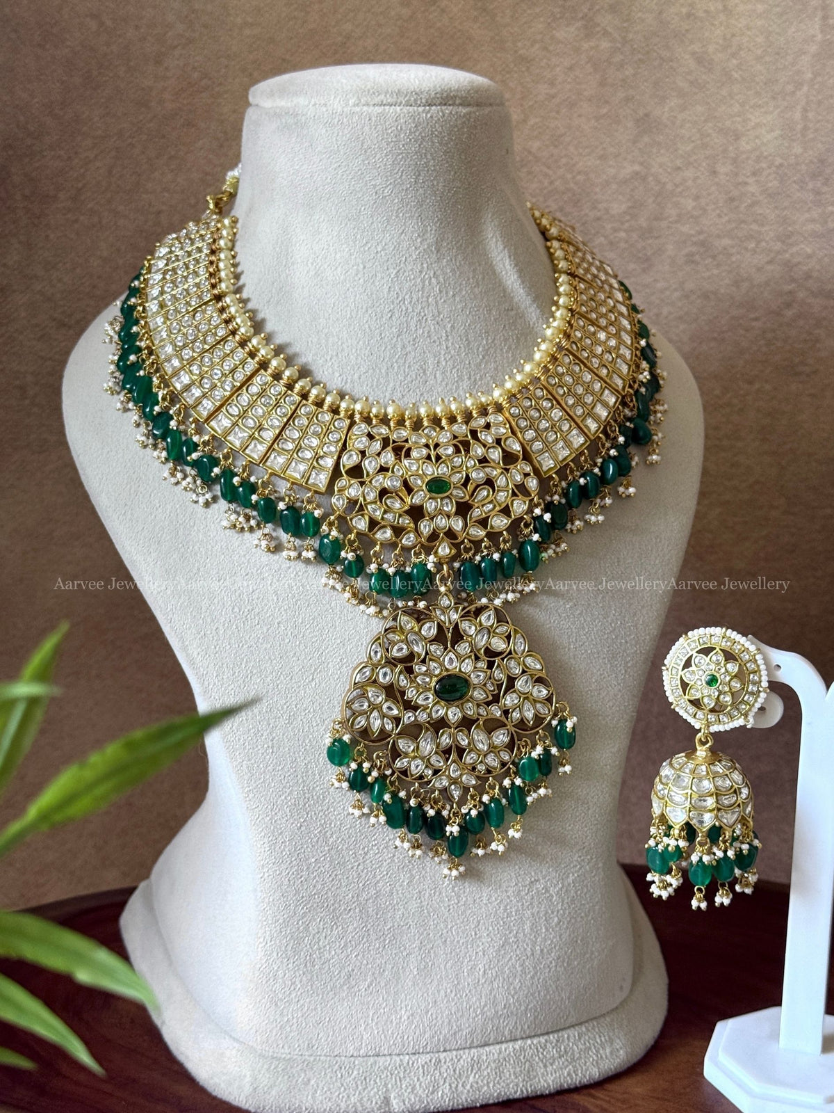 JADAU KUNDAN WHITE STONE STATEMENT NECKLACE AND BUTTA JHUMKI WITH GREEN BEADS