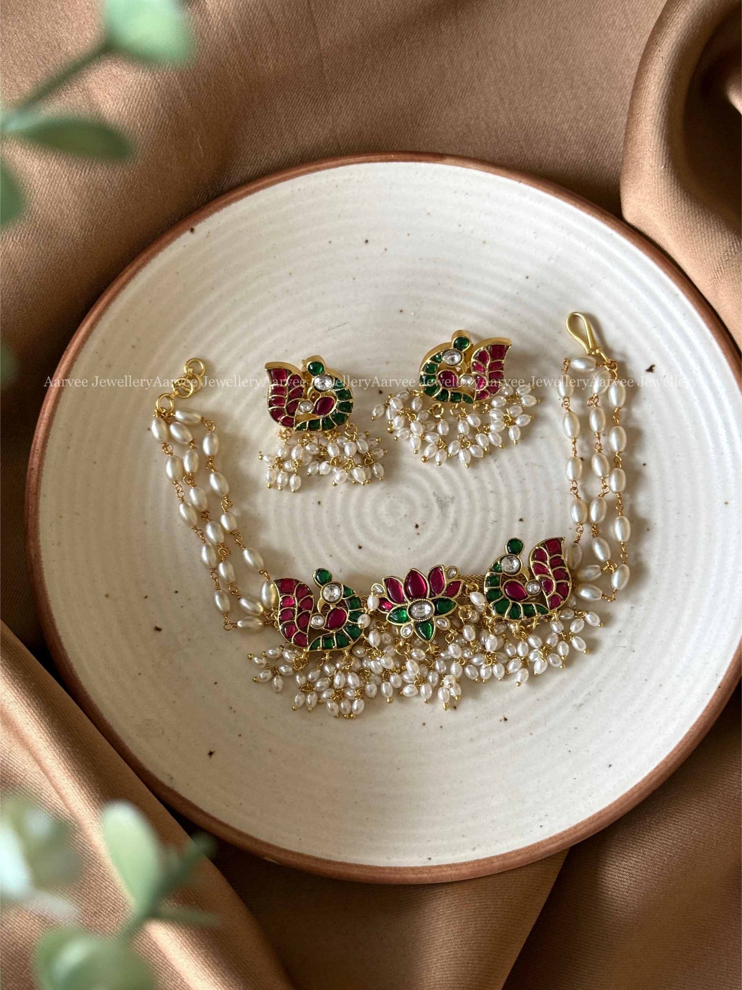 JADAU KUNDAN LOTUS & PEACOCK PEARL LINE CHOKER SET