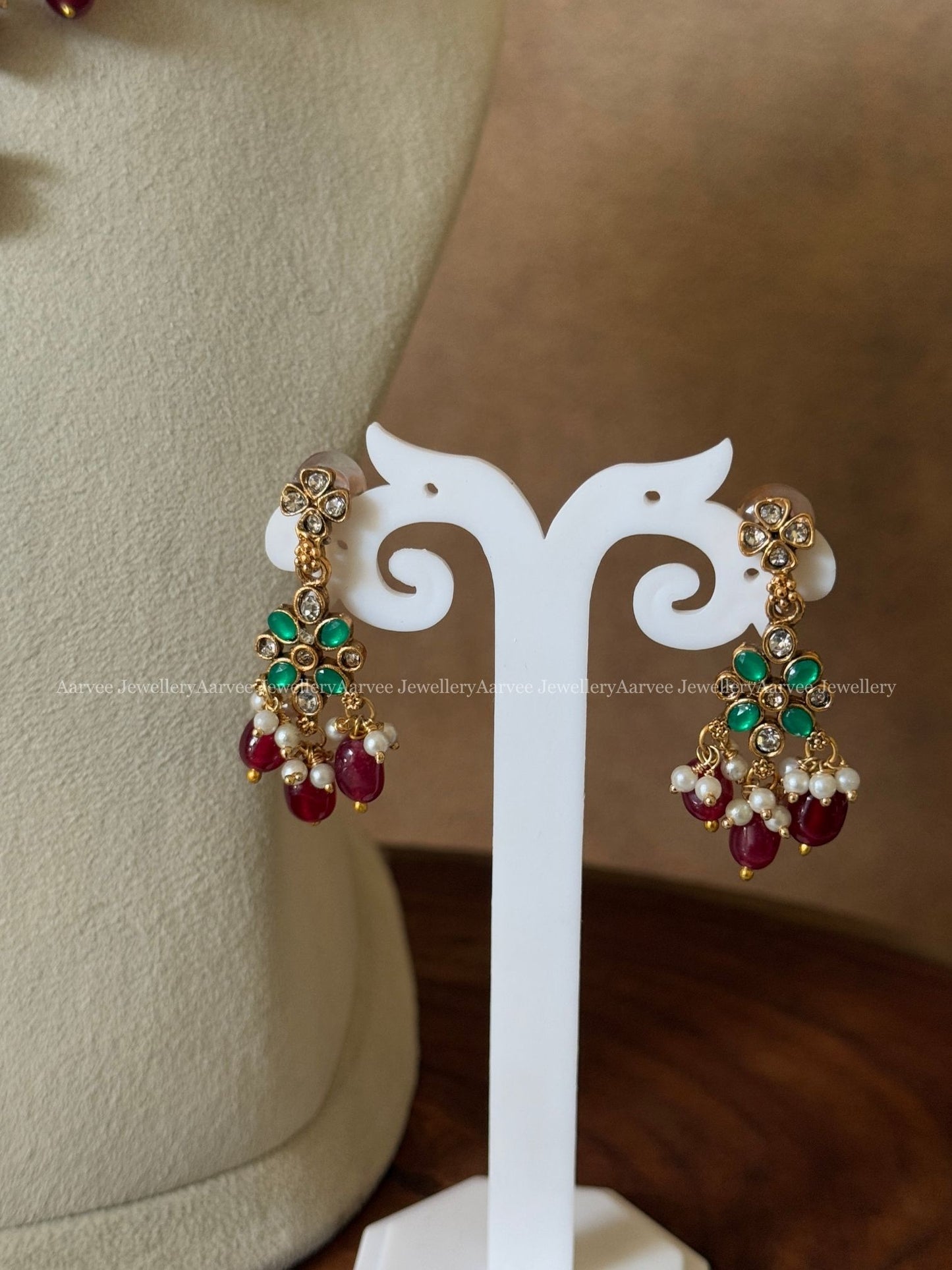 ELEPHANT KANTI NECKLACE SET WITH GREEN STONE AND RUBY BEADS