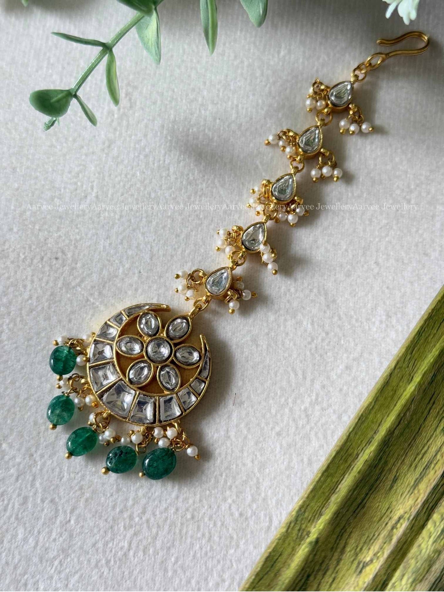 JADAU KUNDAN WHITE STONES CHAND DESIGN TIKKA WITH GREEN BEADS