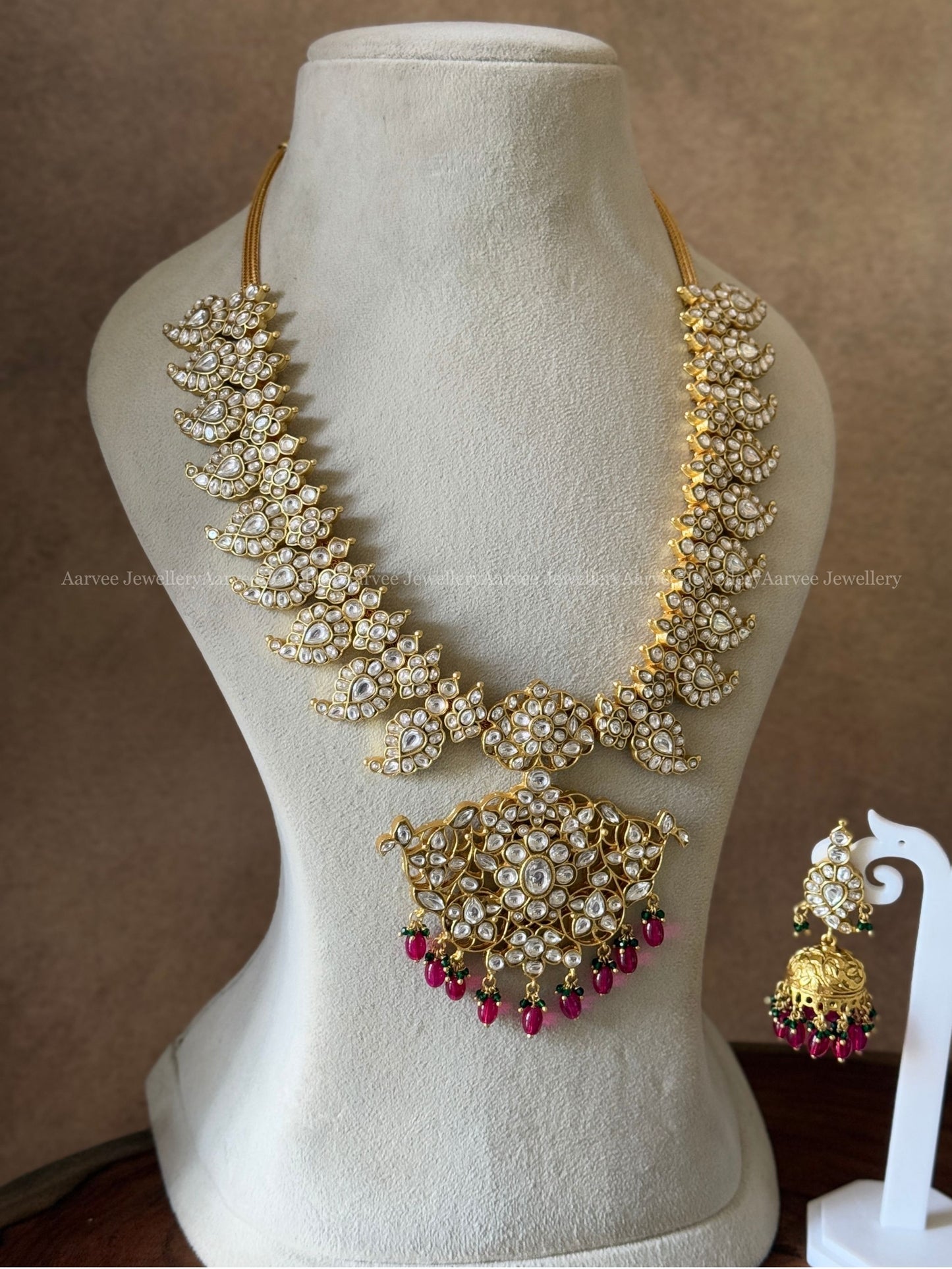 JADAU KUNDAN WHITE STONE MANGO MOTIF MID LENGTH HARAM SET WITH PINK BEADS