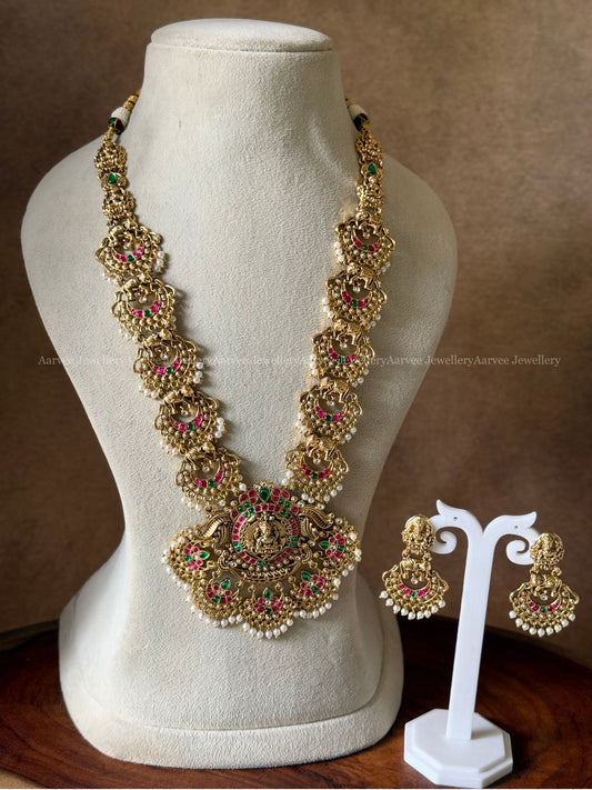 FULL GOLD TONE LAKSHMI MOTIF & KUNDAN STONES HARAM SET
