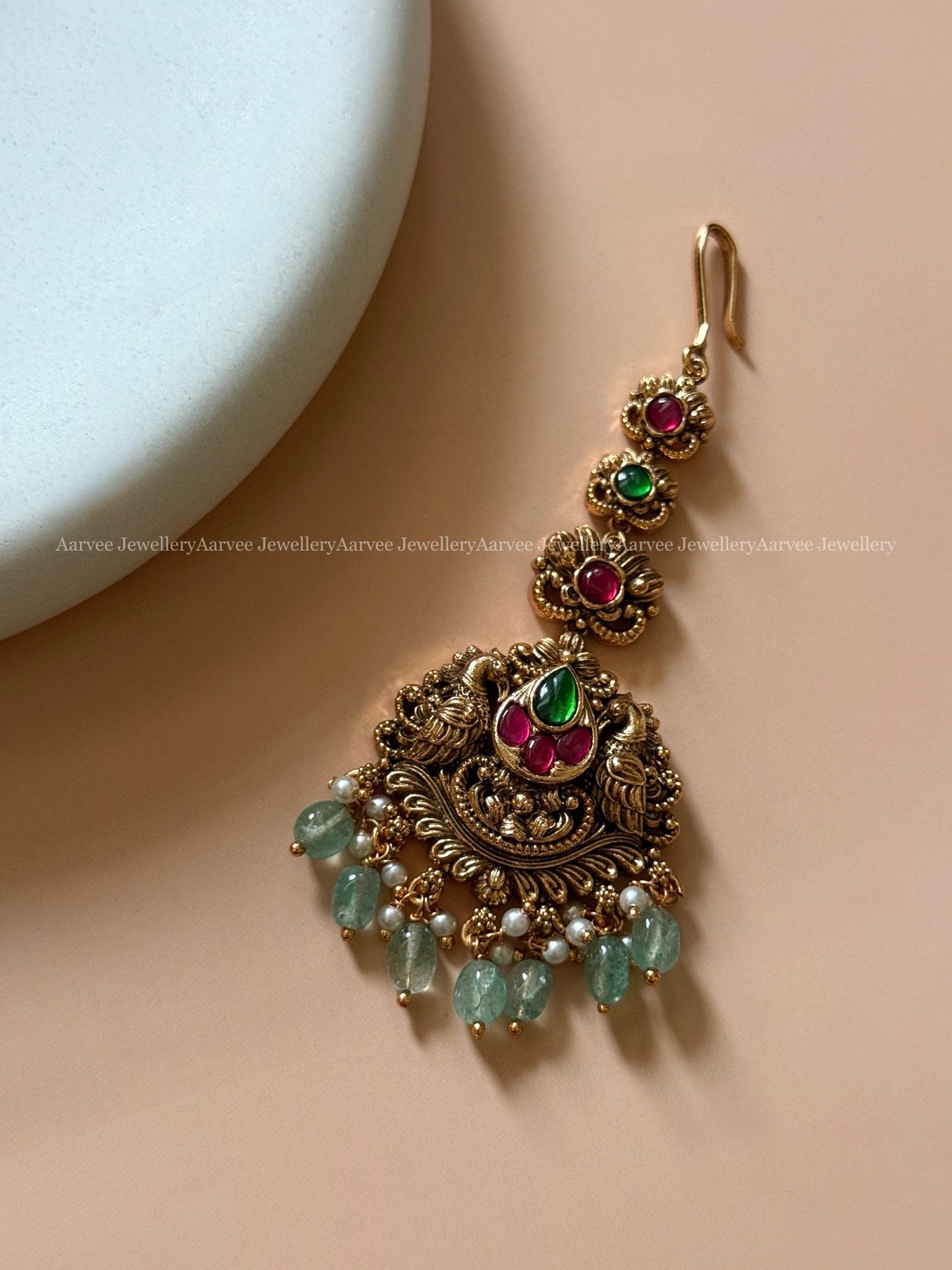 ANTIQUE GOLD PEACOCK MOTIF TIKKA WITH PASTEL BEADS