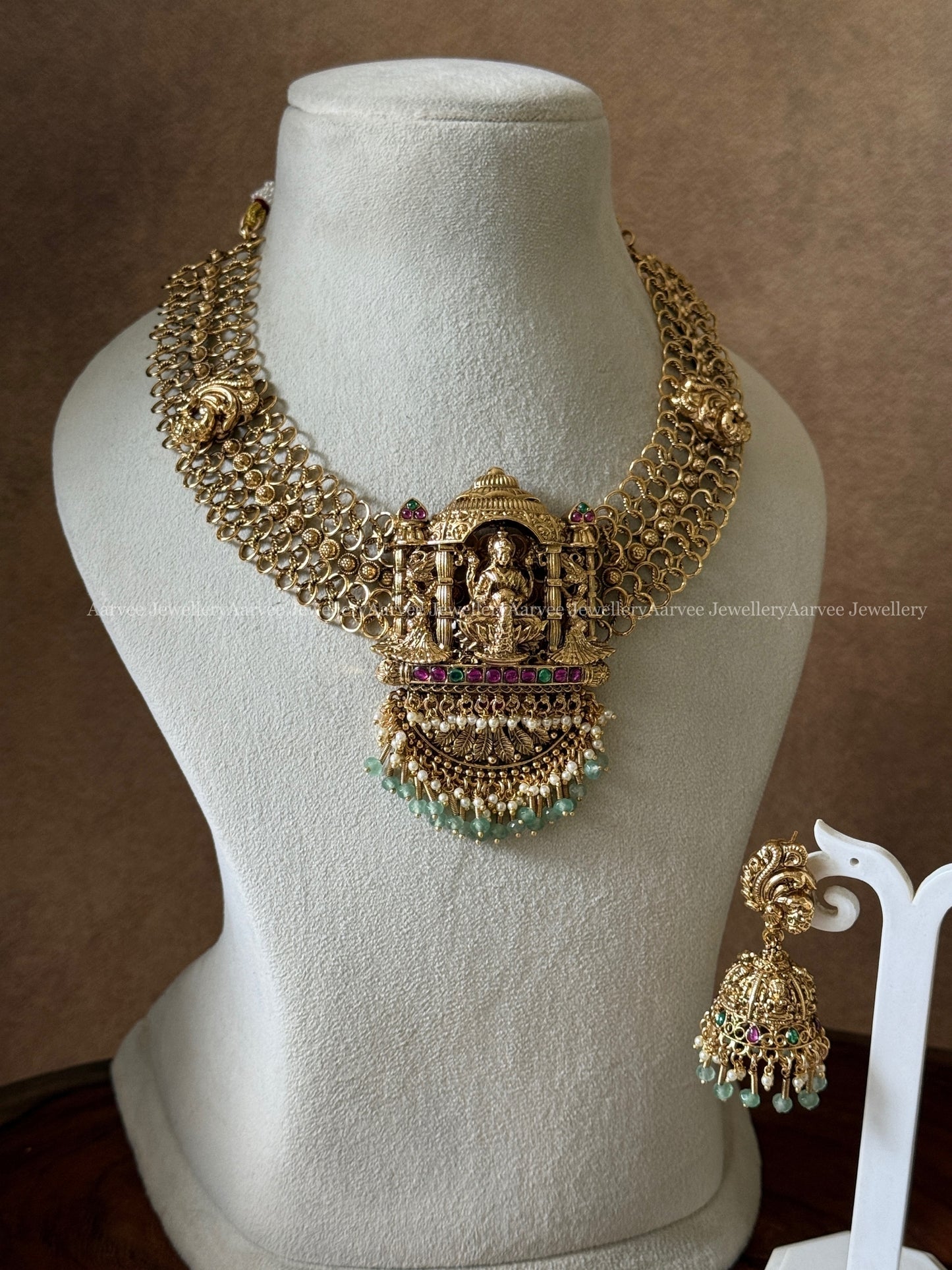 PREMIUM ANTIQUE GOLD FINISH MESH DESIGN LAKSHMI NECKLACE SET WITH PASTEL BEADS