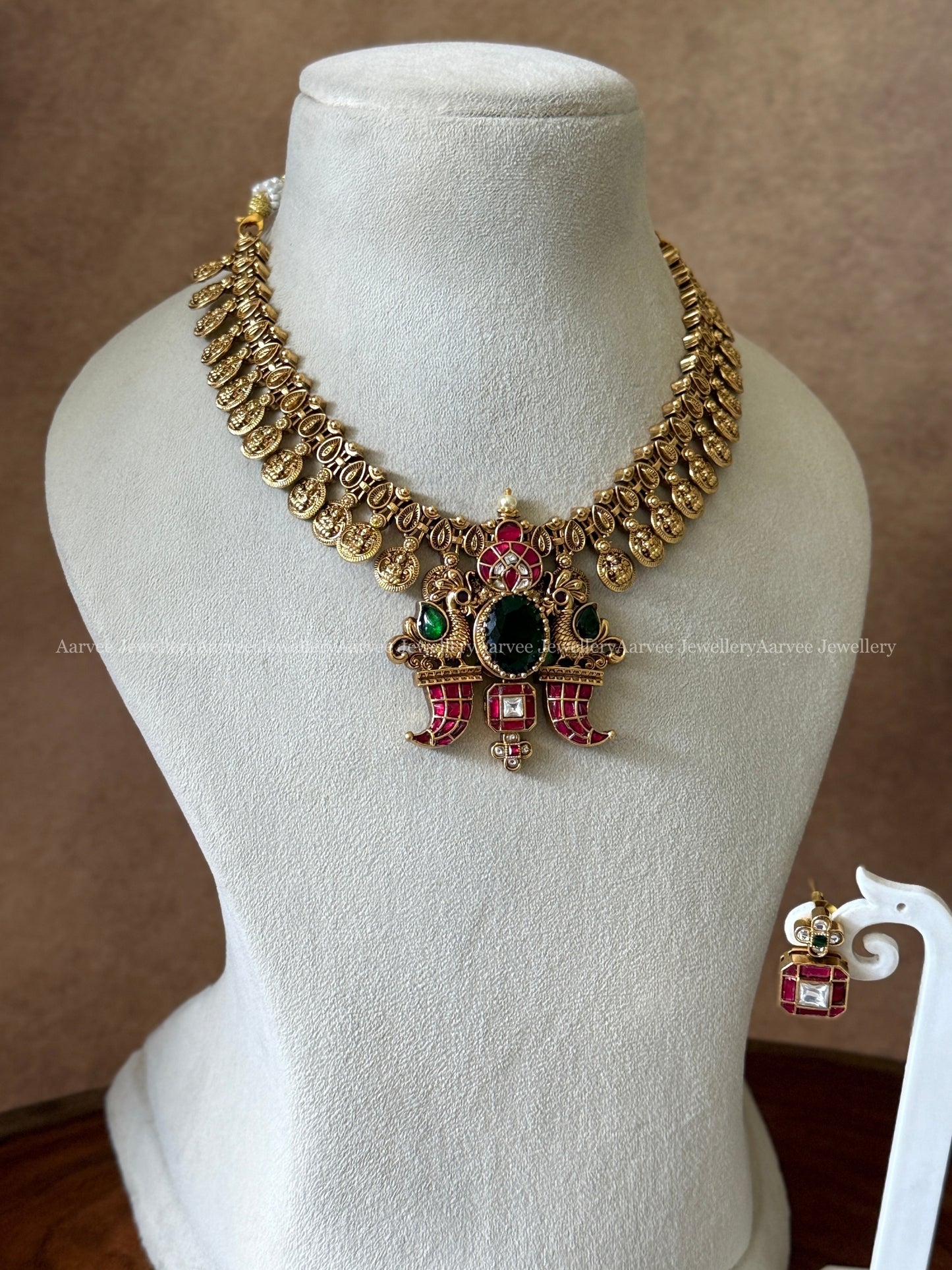GOLD FINISH LAKSHMI COIN FUSION NECKLACE SET WITH PINK / WHITE KEMP STONES PEACOCK PENDANT