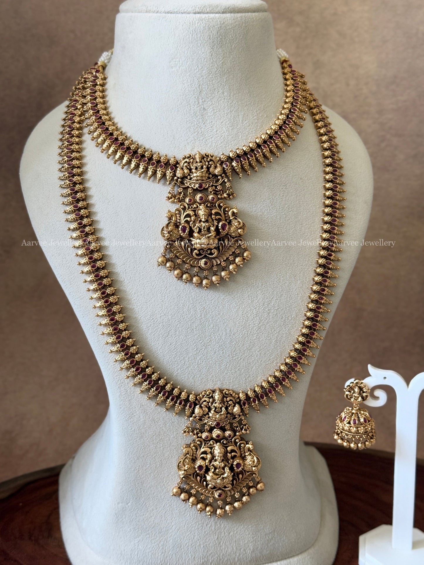ANTIQUE GOLD LAKSHMI PENDANT NECKLACE AND HARAM SET WITH RUBY STONE & GOLD BEADS