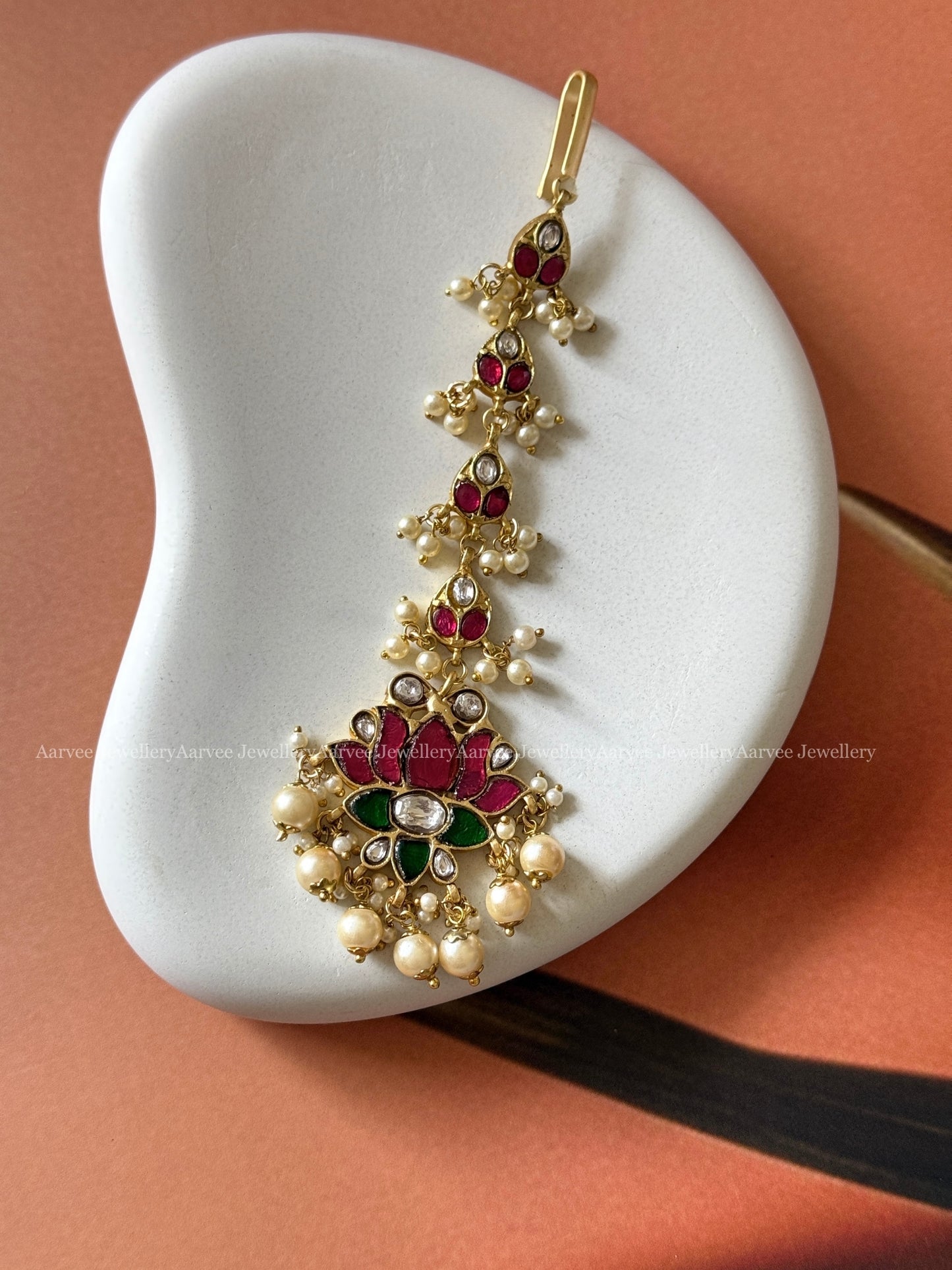 JADAU KUNDAN RUBY / GREEN STONE LOTUS TIKKA WITH PEARLS