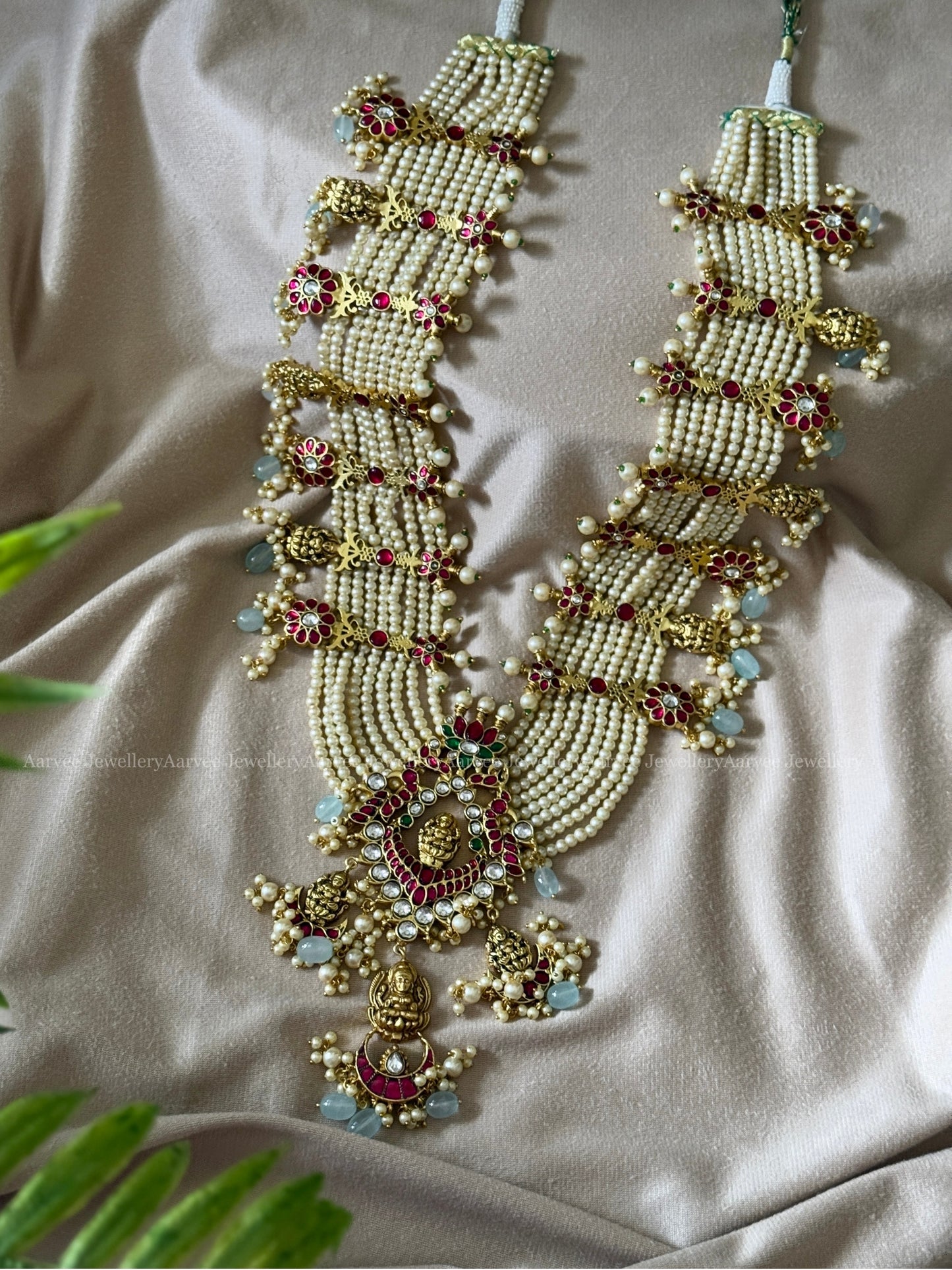 JADAU KUNDAN BRIDAL STATEMENT MULTI LAYERED PEARL HARAM WITH LAKSHMI PENDANT AND PASTEL BEADS
