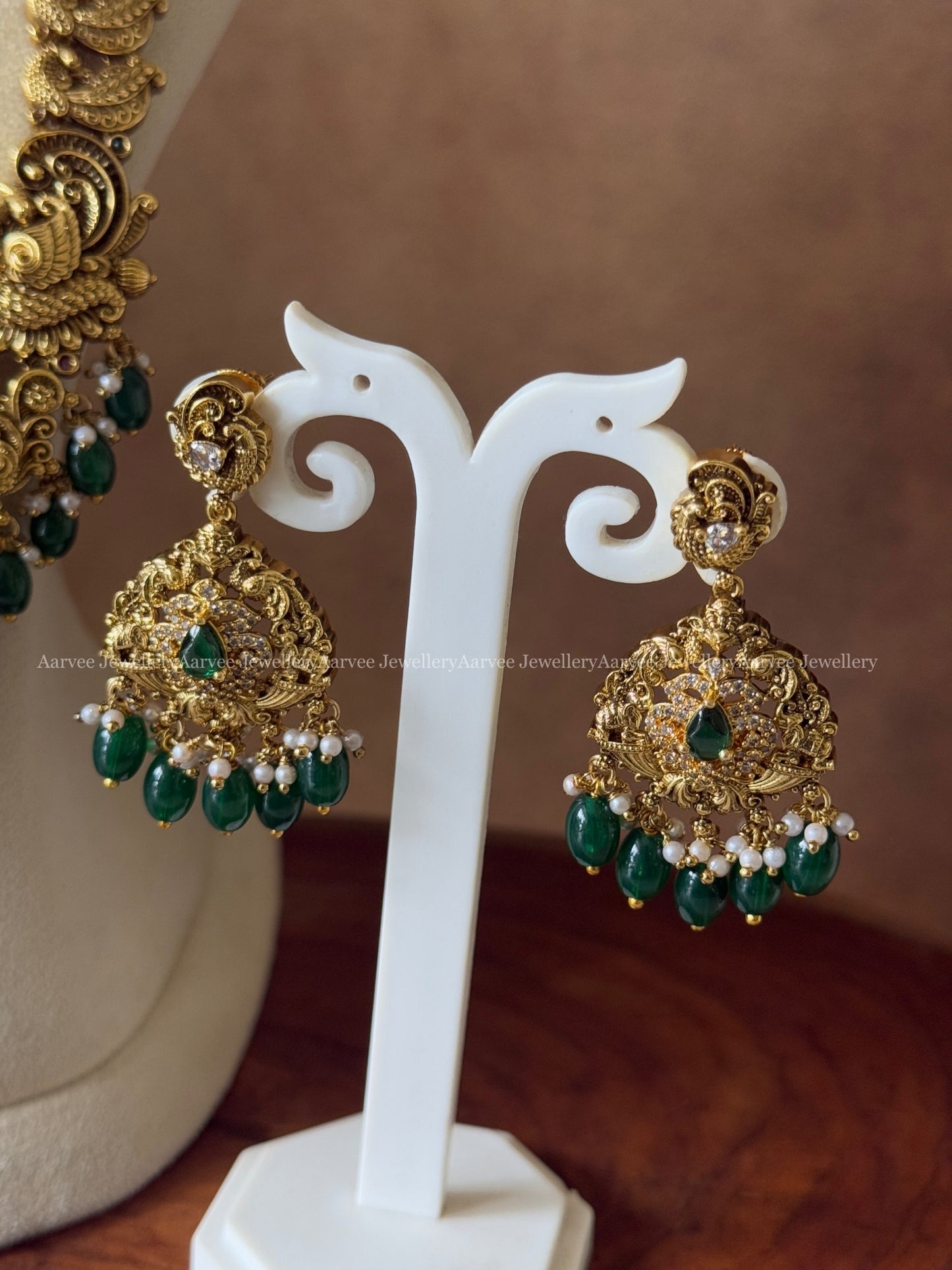 GOLD FINISH NON IDOL HARAM SET WITH GREEN BEADS