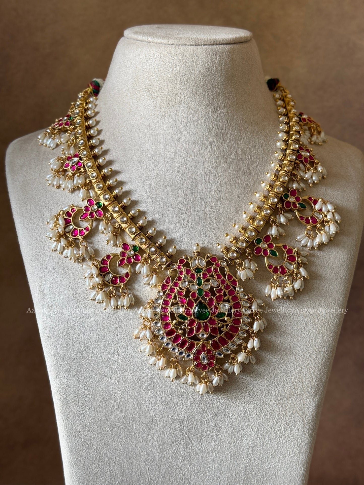 SEMI PRECIOUS KEMP STONES GUTTA PUSALU NECKLACE SET WITH PEACOCK PENDANT & RICE PEARLS | GOLD FINISH