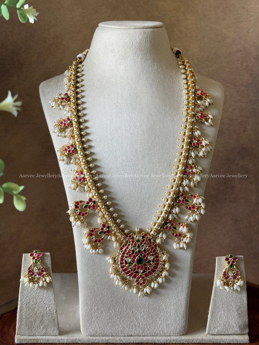 SEMI PRECIOUS KEMP STONES GUTTA PUSALU HARAM SET WITH PEACOCK PENDANT & RICE PEARLS | GOLD FINISH