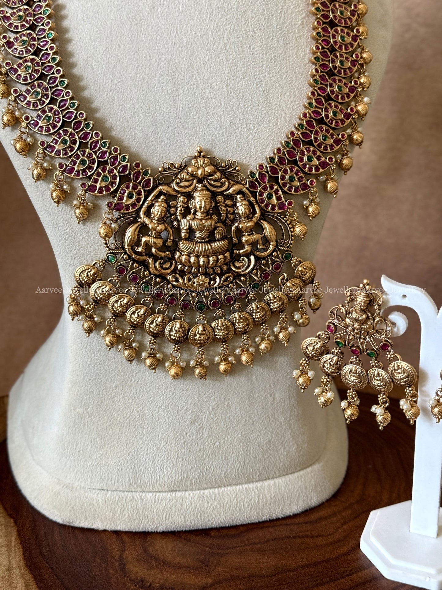 PEARL BUNCH MID LENGTH LAKSHMI PENDANT HARAM SET WITH RUBY / GREEN STONES