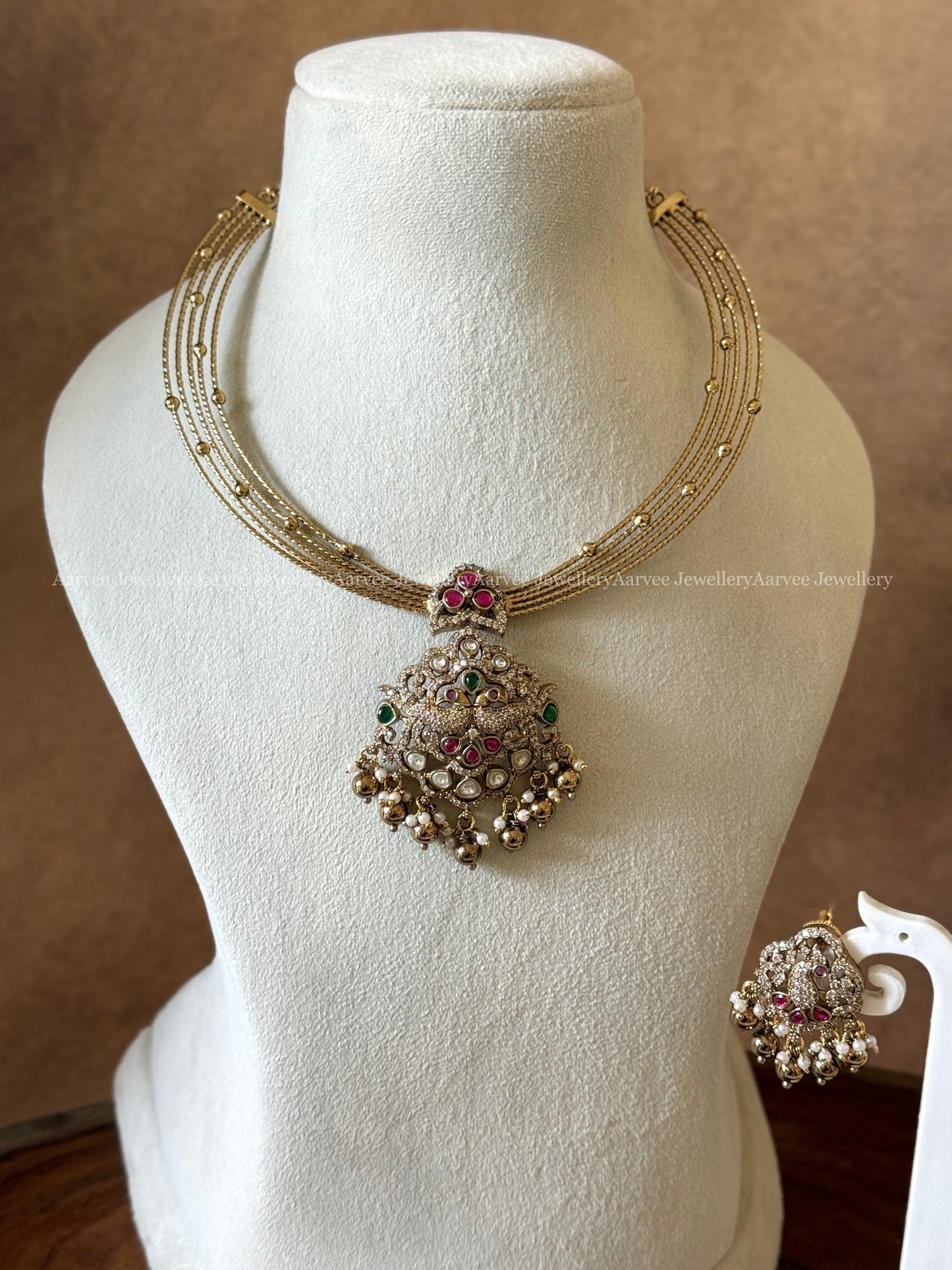 HASLI NECKLACE SET WITH VICTORIAN PEACOCK PENDANT AND RUBY / GREEN STONES