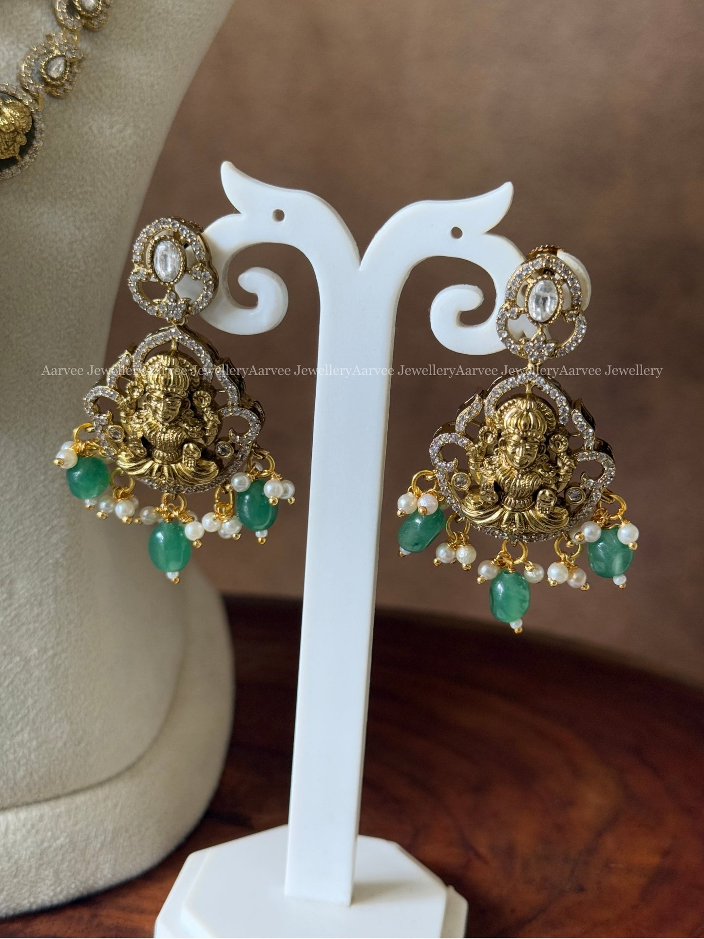 VICTORIAN WHITE STONE LAYERED MID LENGTH HARAM WITH LAKSHMI PENDANT AND PASTEL BEADS