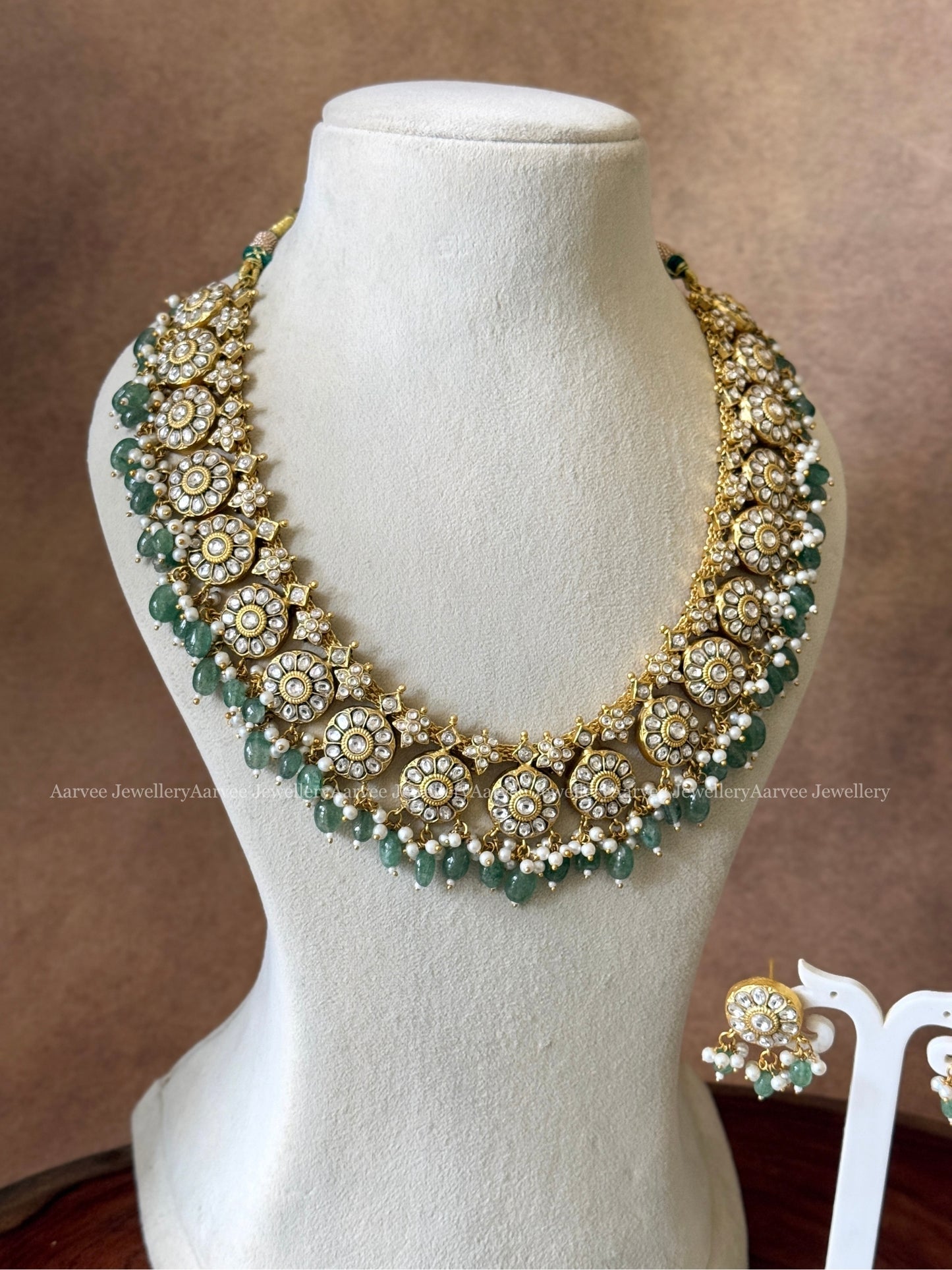 JADAU KUNDAN WHITE STONE BUTTA MID LENGTH NECKLACE SET WITH PASTEL BEADS