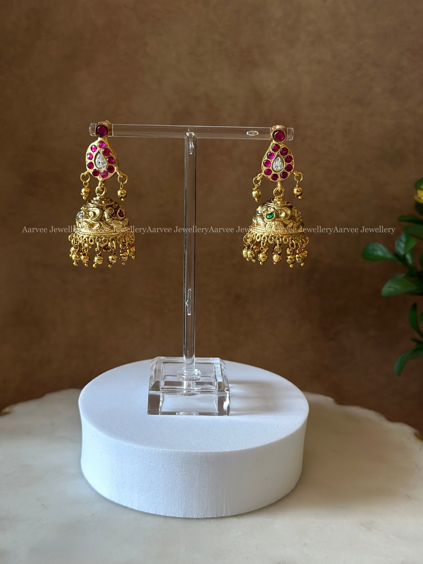 JADAU KUNDAN REVERSIBLE 2 IN 1 MANGO MOTIF JHUMKI WITH PINK AND WHITE STONES & GOLD BEADS