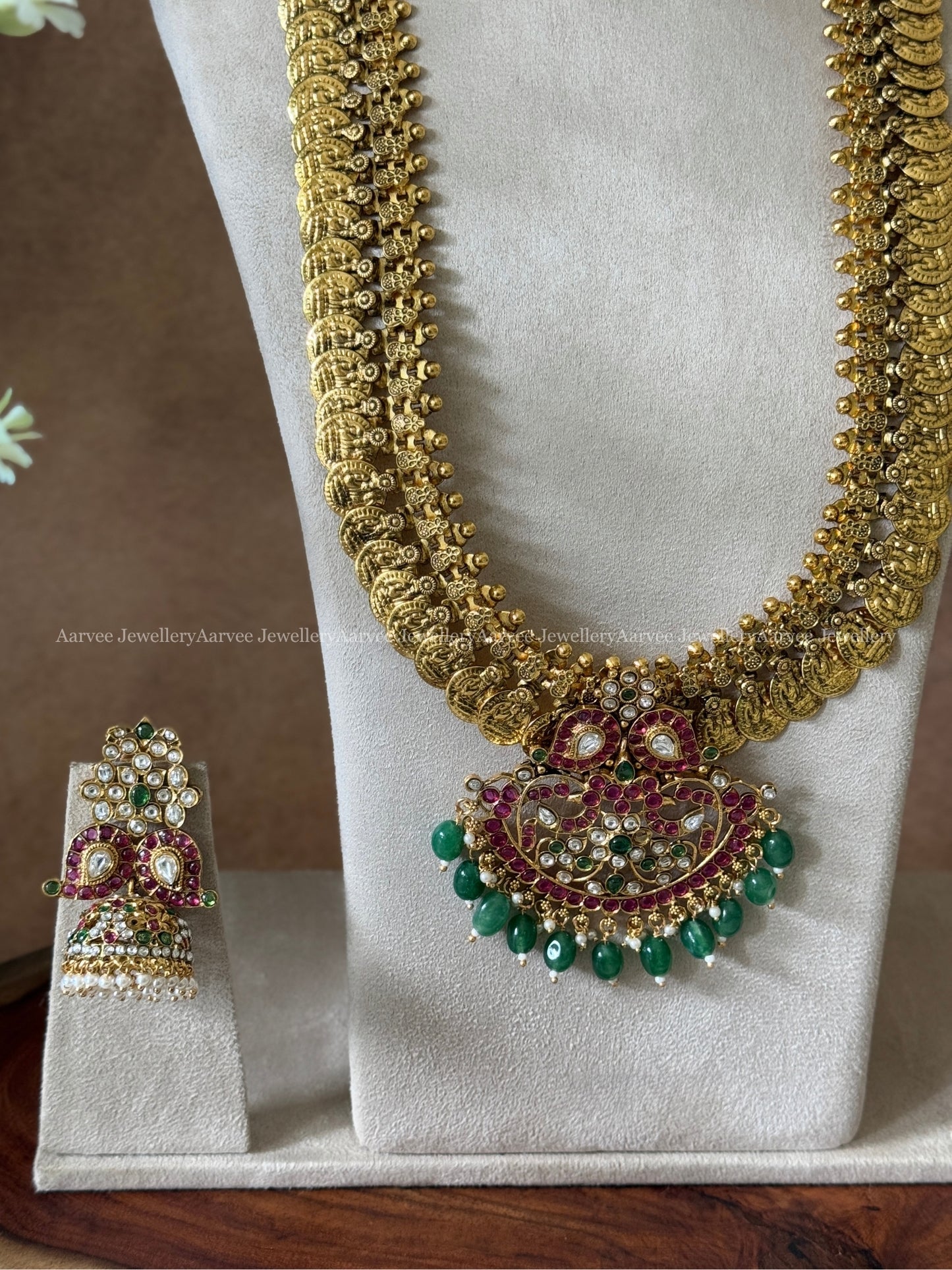 GOLD FINISH COIN MID LENGTH  HARAM SET WITH MANGO KEMP STONES PENDANT IN GREEN BEADS