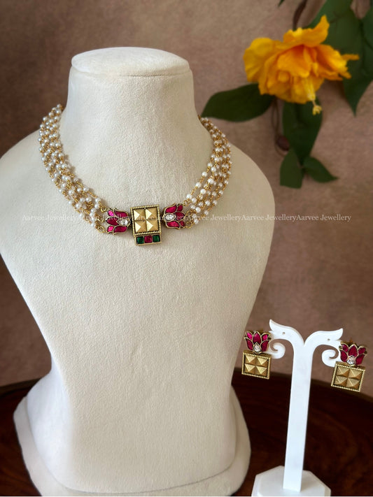 JADAU KUNDAN PEARL LINE CHOKER SET WITH RUBY LOTUS PENDANT