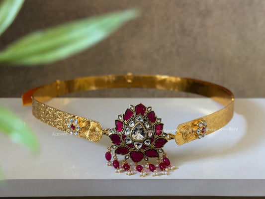 GOLD TONE JADAU KUNDAN WAIST BELT WITH LOTUS PENDANT AND RUBY BEADS
