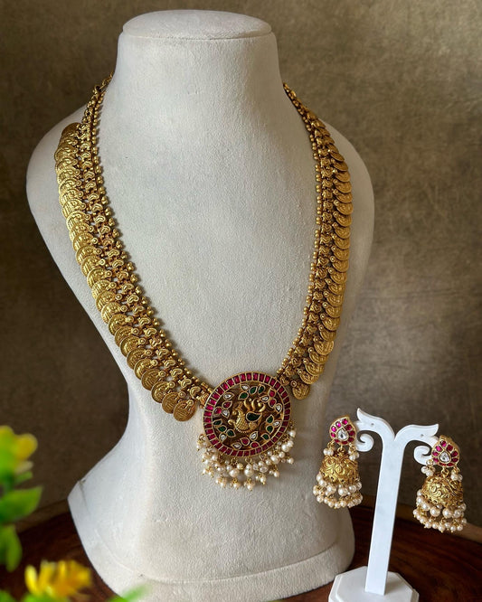 COIN MIDLENGTH CHAIN WITH JADAU KUNDAN PEACOCK PENDANT & JHUMKI IN PEARL BEADS