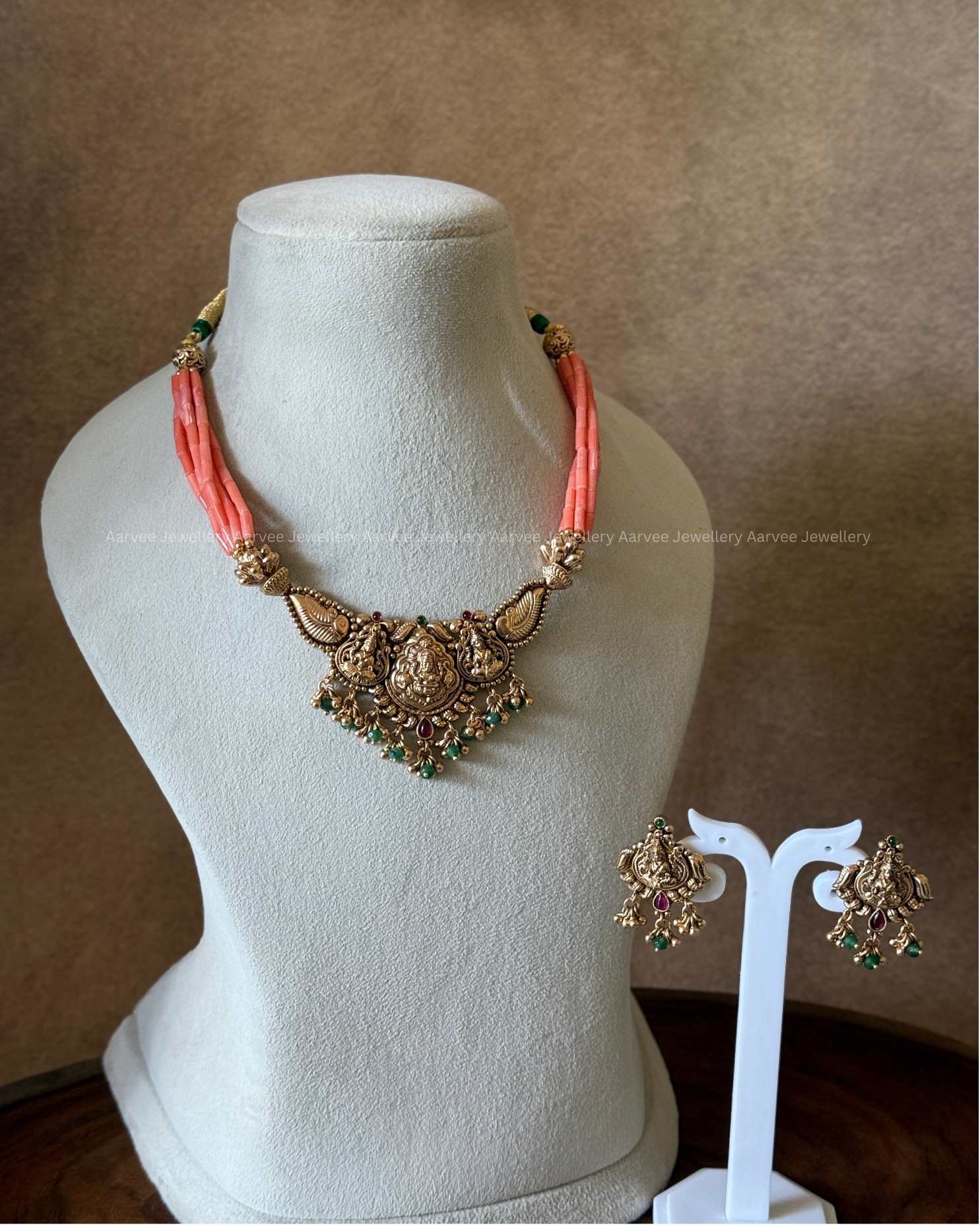 CORAL BEAD NECKLACE SET WITH LAKSHMI MOTIF AND GREEN BEADS