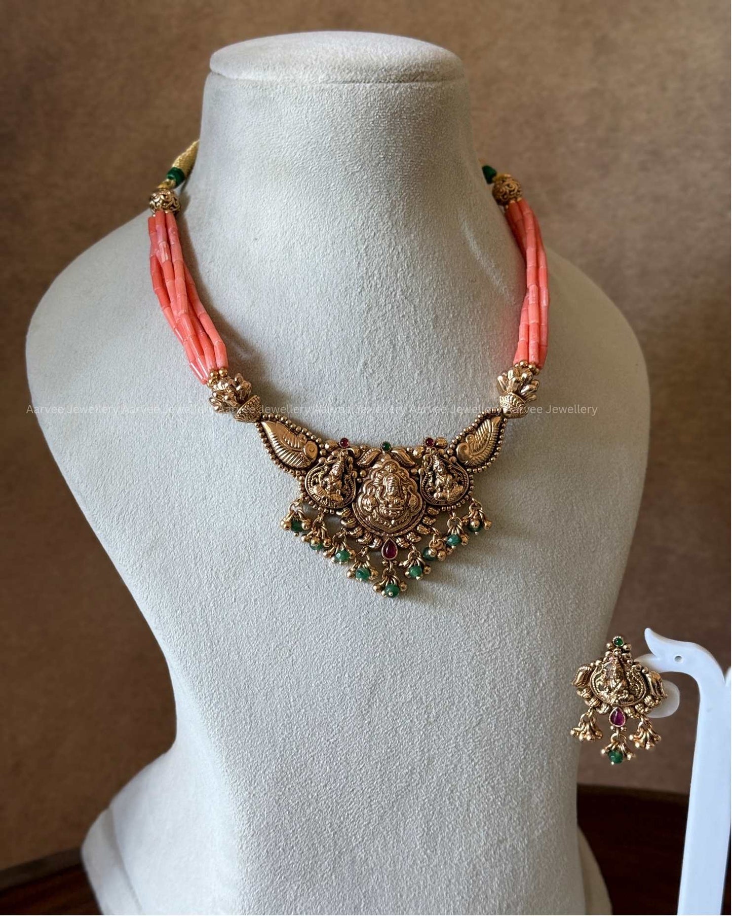 CORAL BEAD NECKLACE SET WITH LAKSHMI MOTIF AND GREEN BEADS