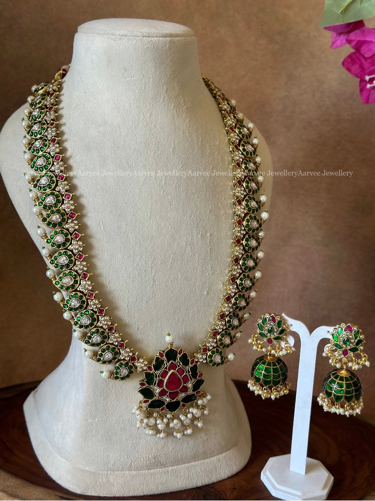 JADAU KUNDAN GREEN STONE MANGO HARAM WITH LOTUS PENDANT & LOTUS JHUMKI