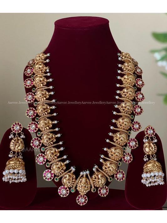 JADAU KUNDAN PINK STONE ANNAM & LAKSHMI PENDANT MID LENGTH HARAM SET WITH PEARL BEADS
