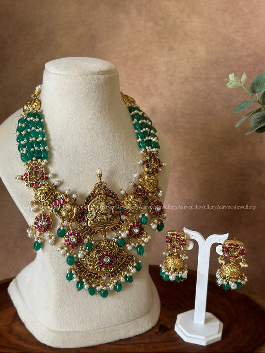 JADAU KUNDAN GREEN BEADED STATEMENT NECKLACE SET WITH NAGAS PENDANT
