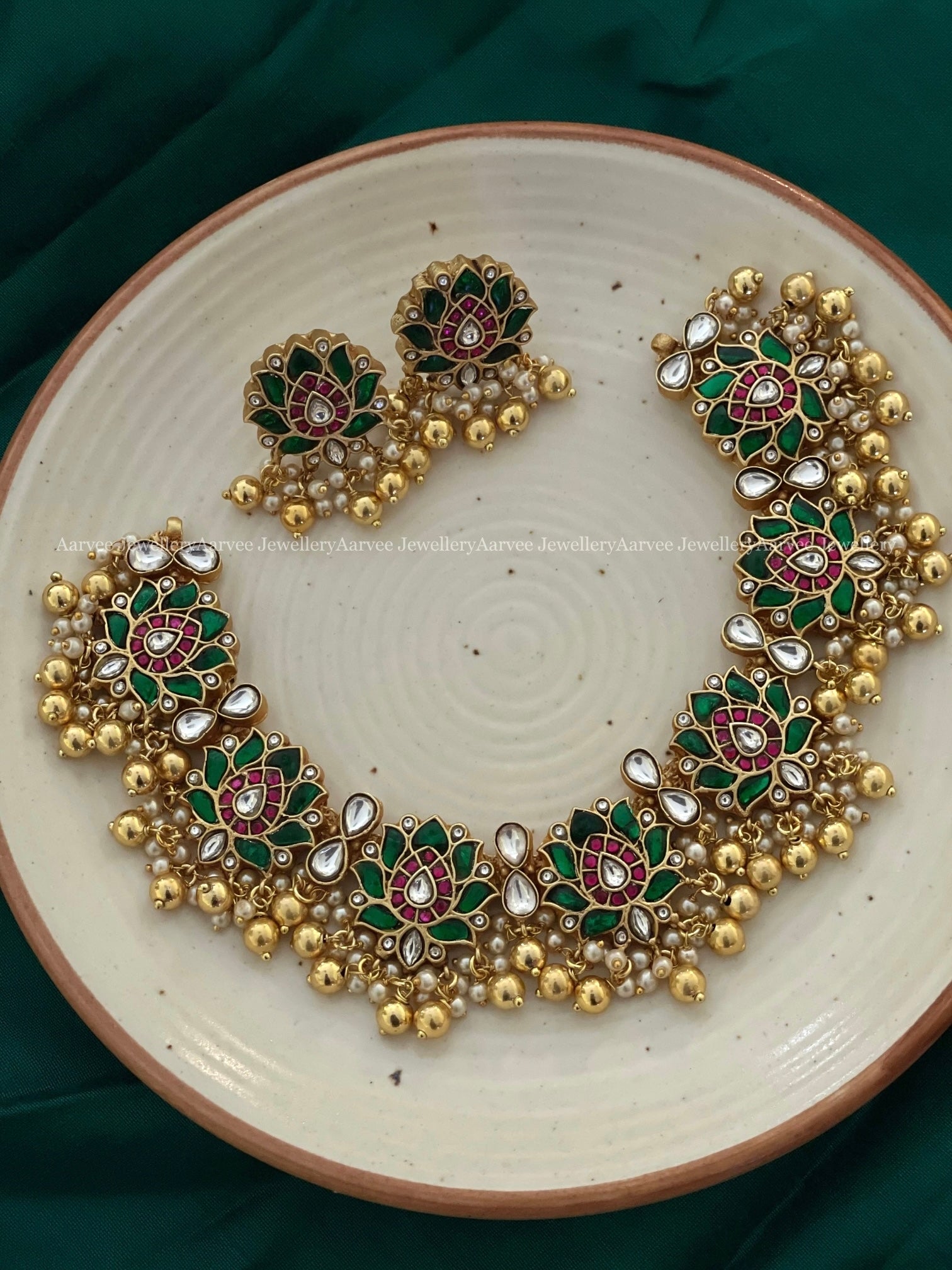 JADAU KUNDAN GREEN STONE LOTUS NECKLACE SET WITH GOLD BEADS