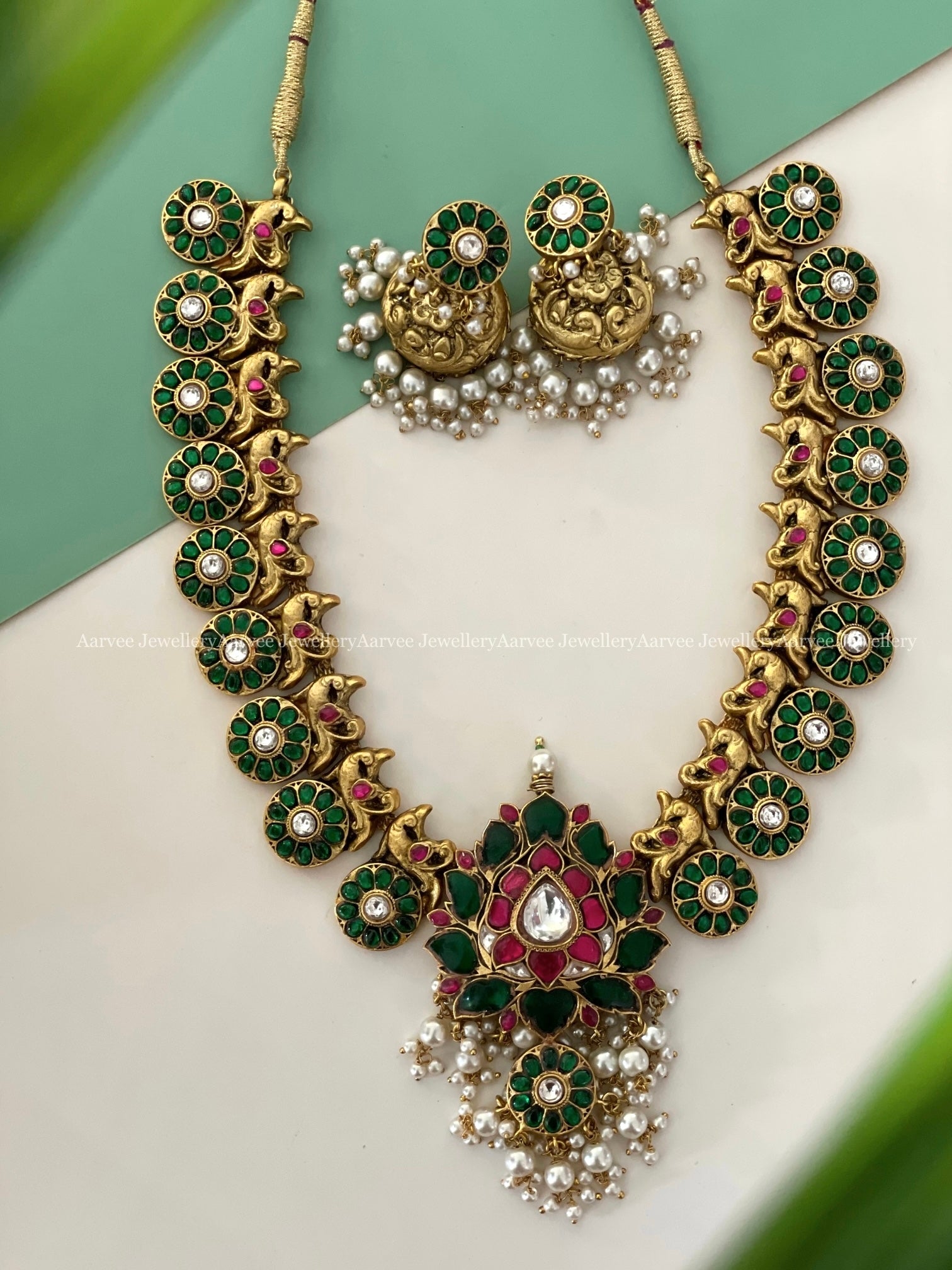 JADAU KUNDAN GREEN STONE LOTUS HARAM SET WITH PEARLS
