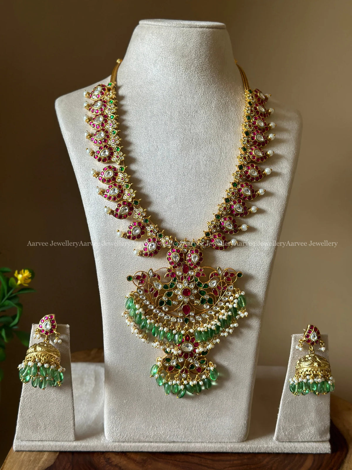 JADAU KUNDAN MANGO MOTIF BRIDAL JEWELLERY SET WITH LIGHT PASTEL GREEN BEADS