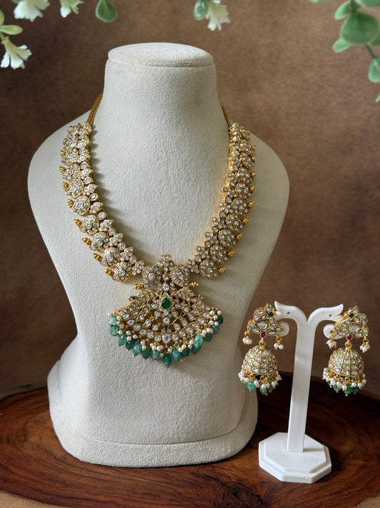 JADAU KUNDAN : FULL WHITE STONES MANGO NECKLACE WITH PEACOK JHUMKI IN PASTEL BEADS